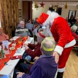 Santa visits our residents. 